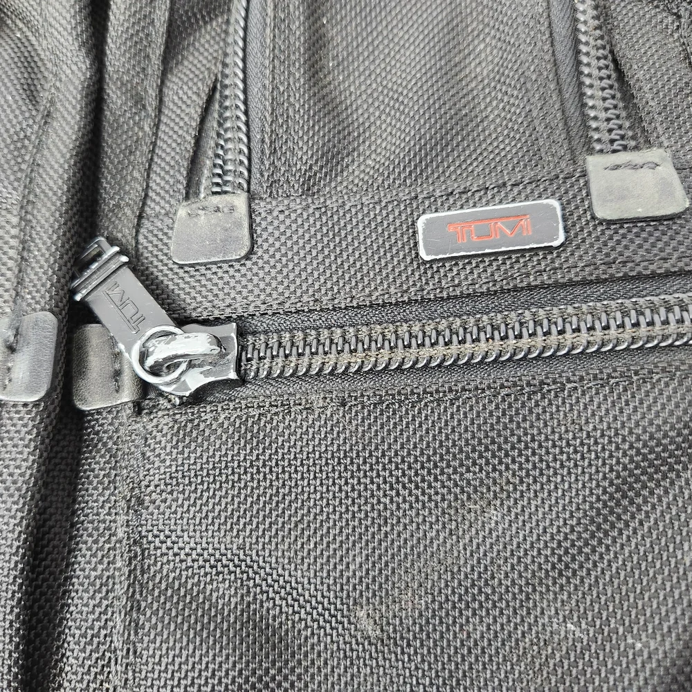 TUMI Black Briefcase with Durable Design